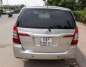 Toyota Innova 2015 - Cần bán xe Toyota Innova đời 2015, màu bạc xe gia đình