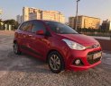 Hyundai Grand i10   2014 - Cần bán gấp Hyundai Grand i10 đời 2014, màu đỏ, số tự động