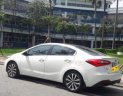 Kia K3  2.0   2015 - Cần bán lại xe Kia K3 2.0 năm sản xuất 2015, màu trắng 