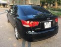 Kia Cerato 1.6 2010 - Bán ô tô Kia Cerato 1.6 đời 2010, màu đen, số tự động