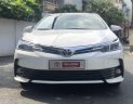 Toyota Corolla altis 1.8E CVT 2017 - Bán xe Toyota Corolla altis 1.8E CVT 2017, màu trắng giá tốt