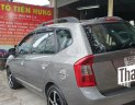 Kia Carens SX 2.0 AT  2010 - Bán Kia Carens SX 2.0 AT sản xuất 2010, màu xám, số tự động 1 chủ mới 90%