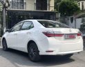 Toyota Corolla altis 1.8E CVT 2017 - Bán xe Toyota Corolla altis 1.8E CVT 2017, màu trắng giá tốt