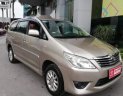 Toyota Innova E 2013 - Bán Toyota Innova E năm sản xuất 2013, màu vàng số sàn, giá 535tr