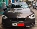 BMW 1 Series 116i 2014 - Bán BMW 1 Series 116i năm sản xuất 2014, màu nâu, xe nhập, giá 850tr