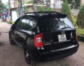 Kia Carens   2.0 AT  2009 - Cần bán xe Kia Carens 2.0 AT sản xuất 2009, màu đen 