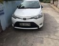 Toyota Vios 1.3E 2014 - Cần bán xe Toyota Vios 1.3E đời 2014, màu trắng, giá tốt