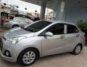 Hyundai Grand i10   2016 - Cần bán lại xe Hyundai Grand i10 năm 2016, màu bạc