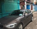 BMW 1 Series 116i 2014 - Bán BMW 1 Series 116i năm sản xuất 2014, màu nâu, xe nhập, giá 850tr