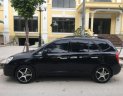 Kia Carens 2010 - Bán Kia Carens 2010, màu đen số sàn, 268 triệu