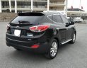 Hyundai Tucson 2.0 AT.  2011 - Cần bán lại xe Hyundai Tucson 2.0 AT. Sản xuất năm 2011, màu đen, xe nhập