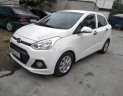 Hyundai Grand i10 2016 - Cần bán Hyundai Grand i10 năm 2016, màu trắng, nhập khẩu nguyên chiếc xe gia đình 