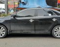 Kia Cerato 2010 - Cần bán lại xe Kia Cerato năm 2010, màu đen xe nhập, 445tr