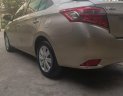 Toyota Vios 1.5E 2017 - Cần bán xe Toyota Vios 2017 bản E số tự động. Xe màu vàng cát