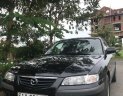 Mazda 626 2002 - Cần bán Mazda 626 đời 2002, xe gia đình dư dùng