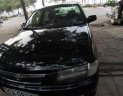 Mazda 323   2000 - Bán xe Mazda 323 đời 2000, màu đen  