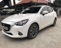 Mazda 2 2016 - Bán Mazda 2 sản xuất năm 2016, màu trắng số tự động