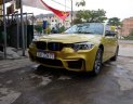 BMW 3 Series  E46 318i M3 F80 2004 - Cần bán lại xe BMW 3 Series E46 318i M3 F80 sản xuất 2004, màu vàng, 400tr