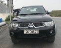 Mitsubishi Triton 2011 - Nhà mình cần bán chiếc xe Mitsubishi Triton 2011, màu đen