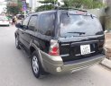 Ford Escape 2.3 AT 4X4 2005 - Bán ô tô Ford Escape 2.3 AT 4X4 đời 2005, màu đen, nhập khẩu nguyên chiếc 