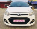 Hyundai Grand i10   2015 - Cần bán lại xe Hyundai Grand i10 năm 2015, màu trắng, xe nhập