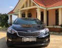 Kia K3 1.6 MT 2015 - Cần bán lại xe Kia K3 1.6 MT năm sản xuất 2015, màu đen số sàn, giá tốt