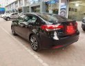 Kia Cerato   1.6AT 2016 - Cần bán gấp Kia Cerato 1.6AT năm 2016, màu đen số tự động, giá chỉ 589 triệu