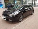 Kia Cerato   1.6AT 2016 - Cần bán gấp Kia Cerato 1.6AT năm 2016, màu đen số tự động, giá chỉ 589 triệu