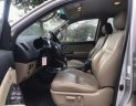 Toyota Fortuner V 2014 - Cần bán Toyota Fortuner V sản xuất 2014, màu bạc