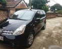 Nissan Grand livina  MT 2010 - Cần bán xe Nissan Livina đời 2010, màu đen, xe đẹp