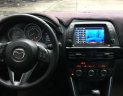 Mazda CX 5  AT  2014 - Cần bán lại xe Mazda CX 5 AT đời 2014, màu đen chính chủ, giá chỉ 696 triệu