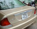 Ford Laser Delu 1.6 MT 2001 - Cần bán Ford Laser Delu 1.6 MT sản xuất 2001, màu ghi vàng, giá tốt