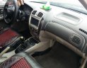 Ford Laser Ghia 2004 - Bán Ford Laser Ghia 2004, màu đen như mới, giá tốt