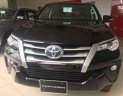 Toyota Fortuner 2.4 MT 2018 - Cần bán lại xe Toyota Fortuner 2.4 MT năm sản xuất 2018, màu đen số sàn