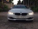 BMW 3 Series  320i  2012 - Cần bán lại xe BMW 320i sản xuất năm 2012, màu trắng, nhập khẩu nguyên chiếc