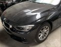 BMW 3 Series  320i  2013 - Cần bán lại xe BMW 320i đời 2013, màu đen, nhập khẩu còn mới, giá chỉ 880 triệu