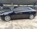 Kia Forte 1.6AT 2011 - Bán Kia Forte 1.6AT đời 2011, màu đen, giá chỉ 430 triệu