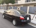 Toyota Vios 1.5E 2011 - Cần bán gấp chiếc Toyota Vios 1.5E 2011 số sàn, màu đen, chính chủ gia đình tôi