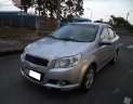 Chevrolet Aveo LT 1.5 MT 2015 - Cần bán gấp Chevrolet Aveo LT 1.5 MT đời 2015, màu bạc như mới