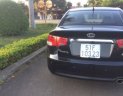 Kia Forte 2010 - Cần bán Kia Forte 2010, màu đen xe gia đình