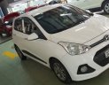 Hyundai Grand i10 1.2AT 2015 - Bán Hyundai Grand i10 1.2AT sản xuất 2015, màu trắng, nhập khẩu nguyên chiếc xe gia đình