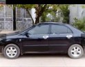 Toyota Corolla altis 2004 - Cần bán lại xe Toyota Corolla altis sản xuất 2004, màu đen, giá tốt