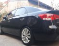 Kia Forte SLI 2009 - Bán Kia Forte SLI năm 2009, màu đen