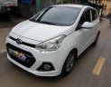 Hyundai Grand i10    1.0 MT 2014 - Cần bán gấp Hyundai Grand i10 1.0 MT năm 2014, màu trắng, xe nhập chính chủ