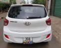 Hyundai Grand i10    1.0 MT 2014 - Cần bán gấp Hyundai Grand i10 1.0 MT năm 2014, màu trắng, xe nhập chính chủ