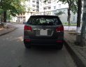 Kia Sorento 2.4AT  2011 - Nhà mình cần bán chiếc xe Kia Sorento đời 2011 số tự động, màu xám