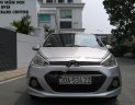 Hyundai Grand i10  1.2 MT Base 2015 - Cần bán Hyundai Grand i10 1.2 MT Base đời 2015, màu bạc, xe nhập như mới