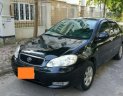 Toyota Corolla altis   2004 - Bán xe Toyota Corolla Altis, màu đen, đời 2004, số tay, nhiên liệu 7 lít, mới đi 12,0000 km