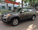 Kia Sorento 2.4AT  2011 - Nhà mình cần bán chiếc xe Kia Sorento đời 2011 số tự động, màu xám