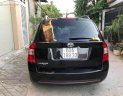 Kia Carens 2010 - Cần bán xe Kia Carens đời 2010, màu đen ít sử dụng 